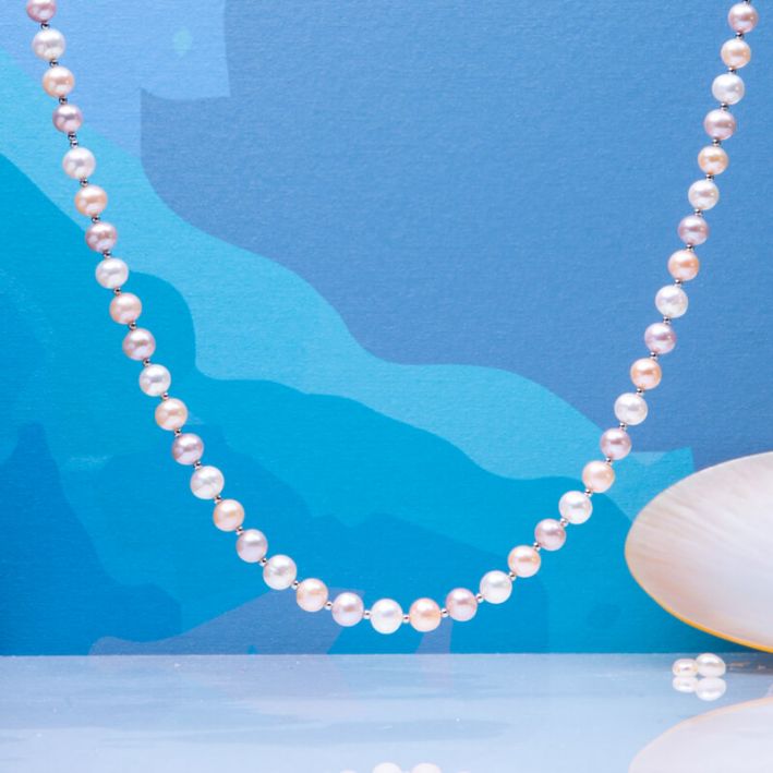 Collier perles de culture blanches, roses, pêches et perles en argent massif