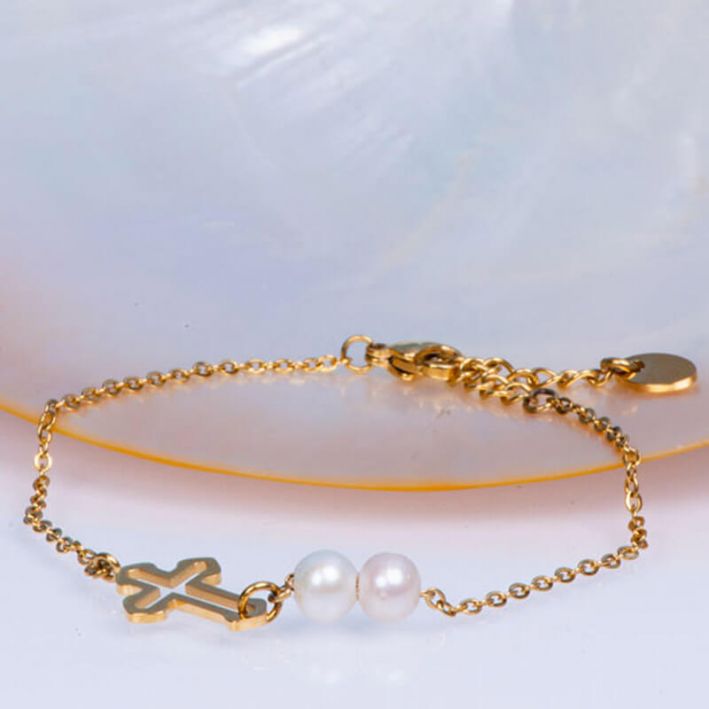 Bracelet deux perles de culture blanche et croix en acier doré