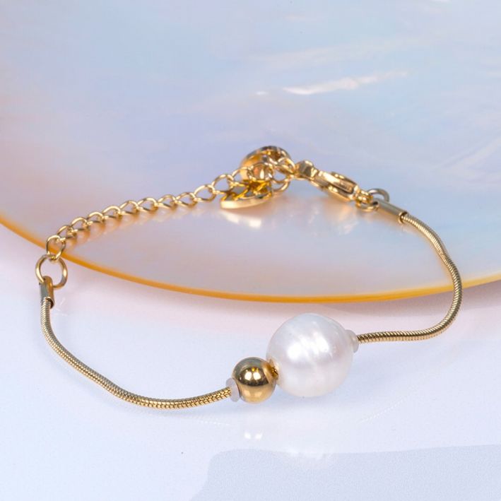 Bracelet HERMIONE perle de culture blanche et perle en métal doré sur acier doré