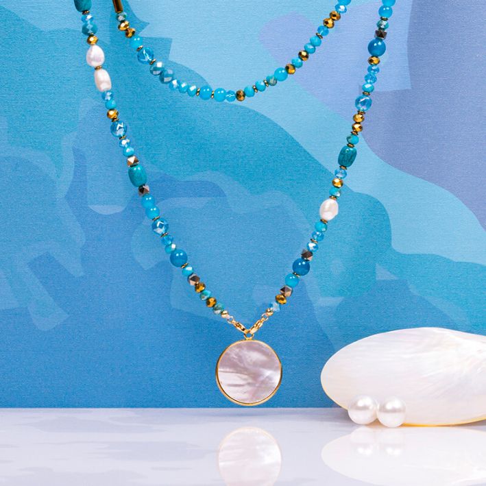 Sautoir EDEN bleu alliance de perles, cristal, pierres et médaille de nacre
