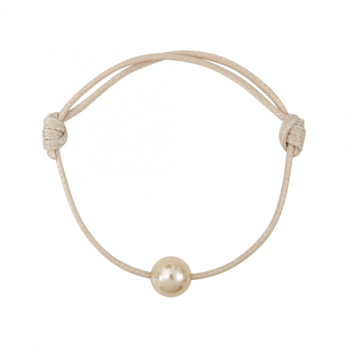 Bracelet une perle nacre dorée sur coton ciré beige