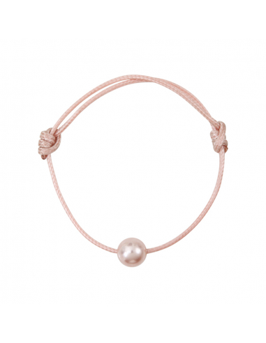 Bracelet une perle nacre rose sur coton ciré rose