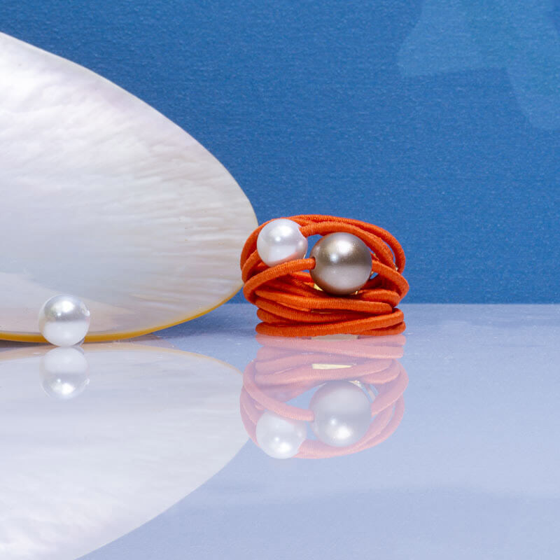 Bague multi rangs élastique orange et duo de perles de nacre